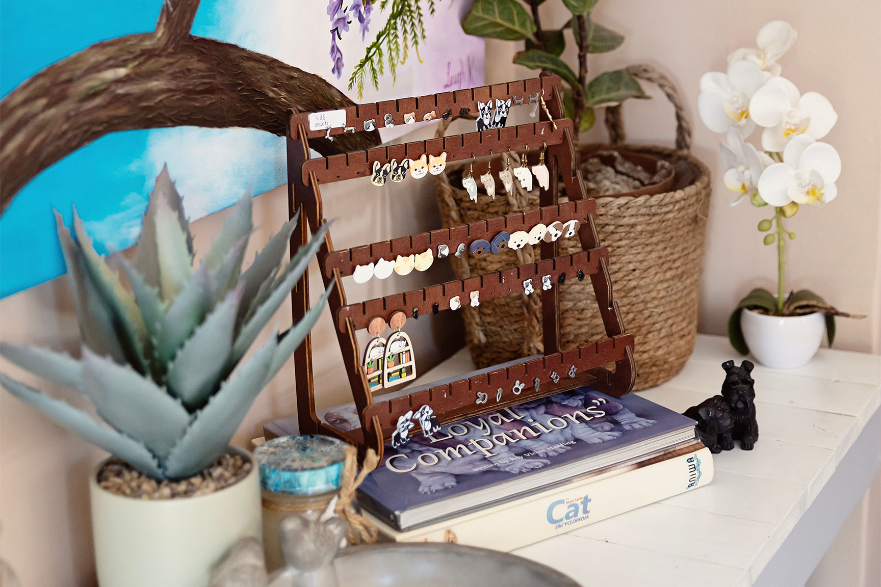 A cute display of pet-themed earrings and gifts available for purchase at the Essential Provisions vet shop in Benoni.