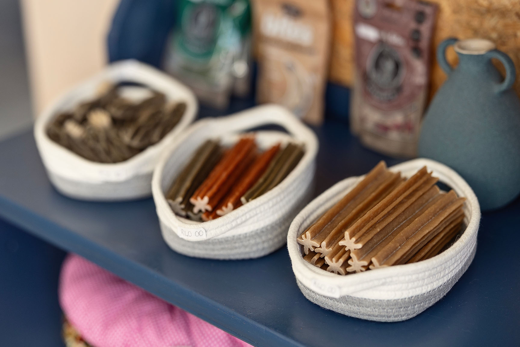 Baskets filled with dental chew sticks for dogs at the Essential Provisions vet shop in Johannesburg.
