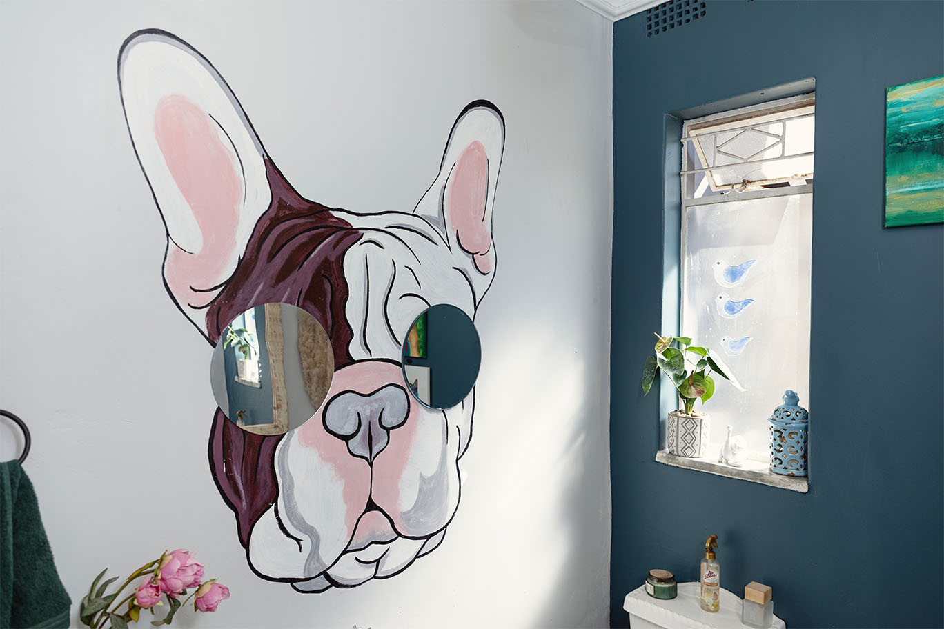 A fun french bulldog wall mural with mirrored sunglasses decorating the interior of the pet grooming spa in Benoni.